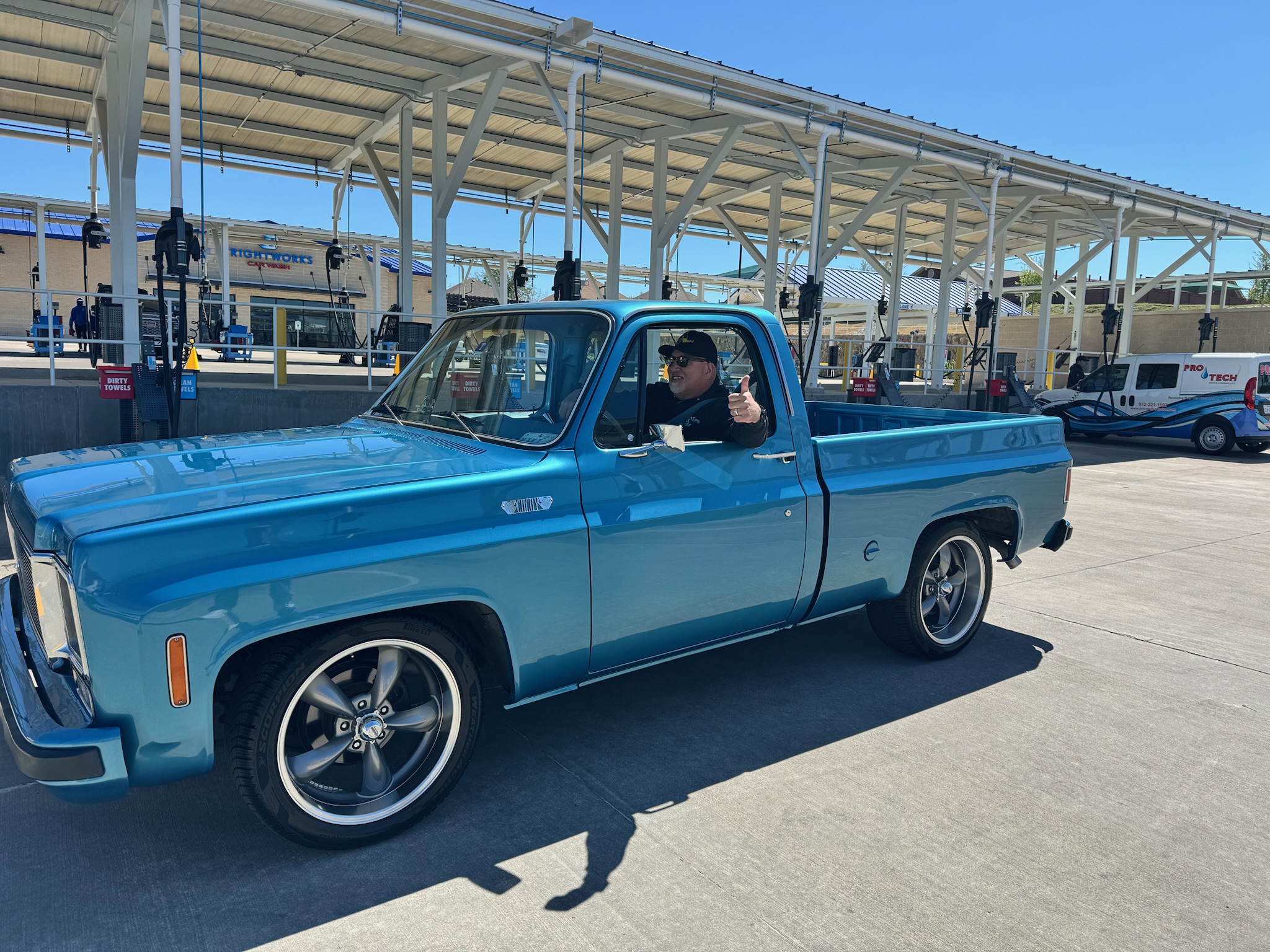 A blue classic Chevrolet pickup at Brightworks Fort Worth.